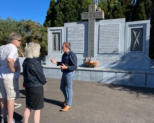 Tour Guide talking to a group at the Michael Collin's Memorial in Co. Cork.