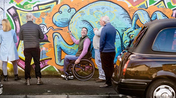 Belfast black cab tour in belfast Gaeltacht quarter.